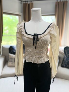 NWT American Eagle Outfitters Cream Ruffled Smocked Blouse with Black Trim
